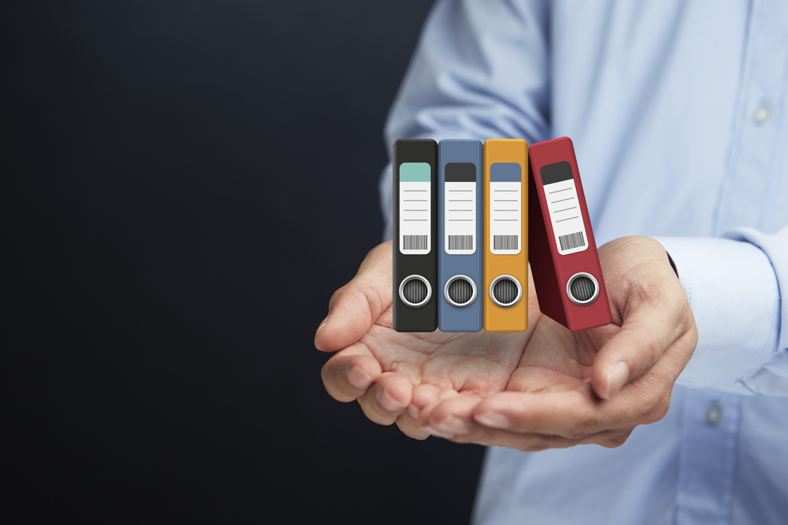 Hand presenting a business storage concept